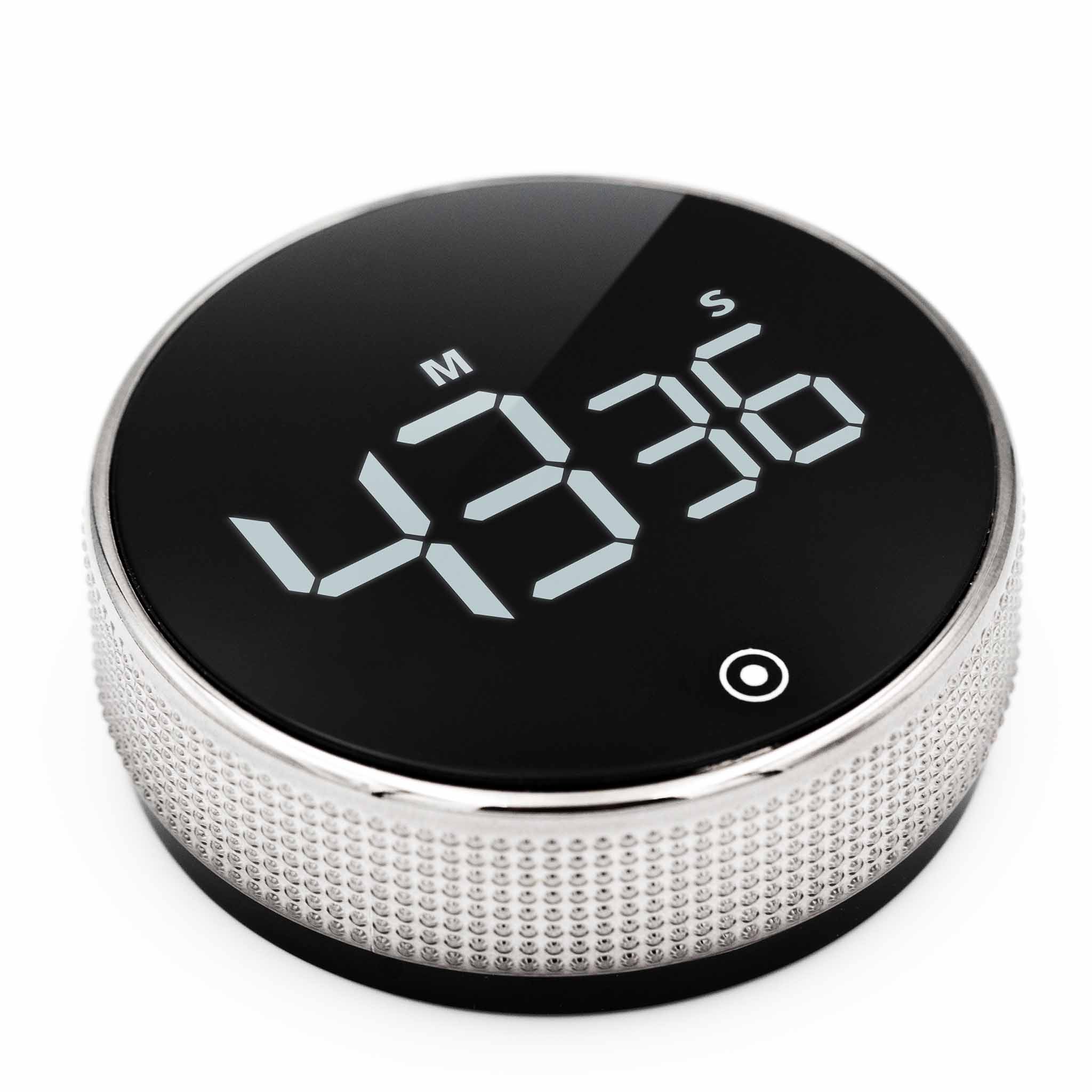 Elegant, rundt digitalt ur med sort skærm og sølvkant, der viser minutter og sekunder på en stor, letlæselig LED-skærm. Ideelt til præcis tidshåndtering og minimalistisk design.